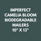 Text on a dark green background reads: "Imperfect Camelia Bloom Biodegradable Mailers 10'' x 13'' US by impack.co"—an eco-friendly option now available at a discounted price.