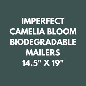 Text reads: "Imperfect Camelia Bloom Biodegradable Mailers 14.5'' x 19'' - US" by impack.co on a dark green background, featuring discounted, eco-friendly shipping supplies.