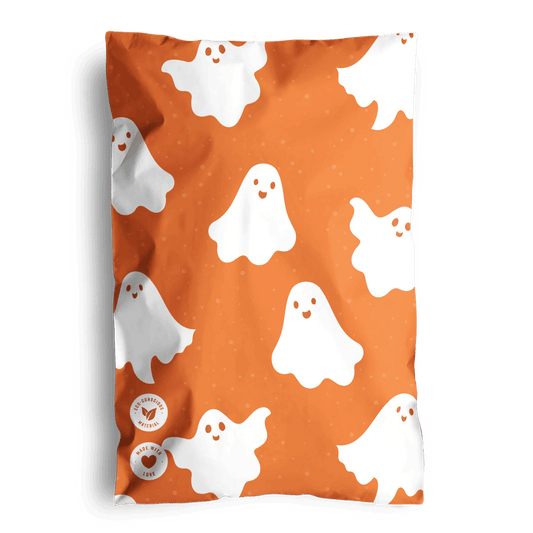 Orange bedding featuring a pattern of white cartoon ghosts, perfect for eco-friendly impack.co Halloween Ghost Pumpkin Biodegradable Mailers 6" x 9" decorations.