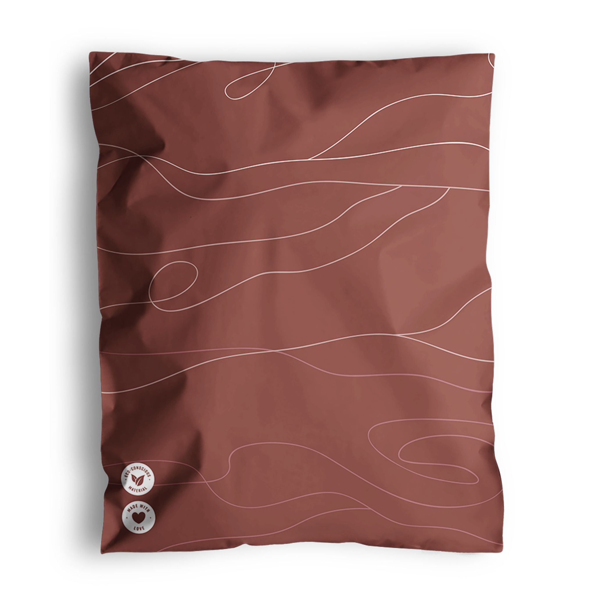 The Terracotta + Sand pillowcase from Fast Bundle, featuring wavy white lines and two small round labels in the bottom corner, adds an earthy elegance.