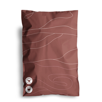 A brown impack.co bag with the Tidal Terracotta Design, showcasing white wavy lines and two circular labels at the bottom, set against a white background. This product is named "SALE - Tidal Terracotta Mailers 6" x 9.