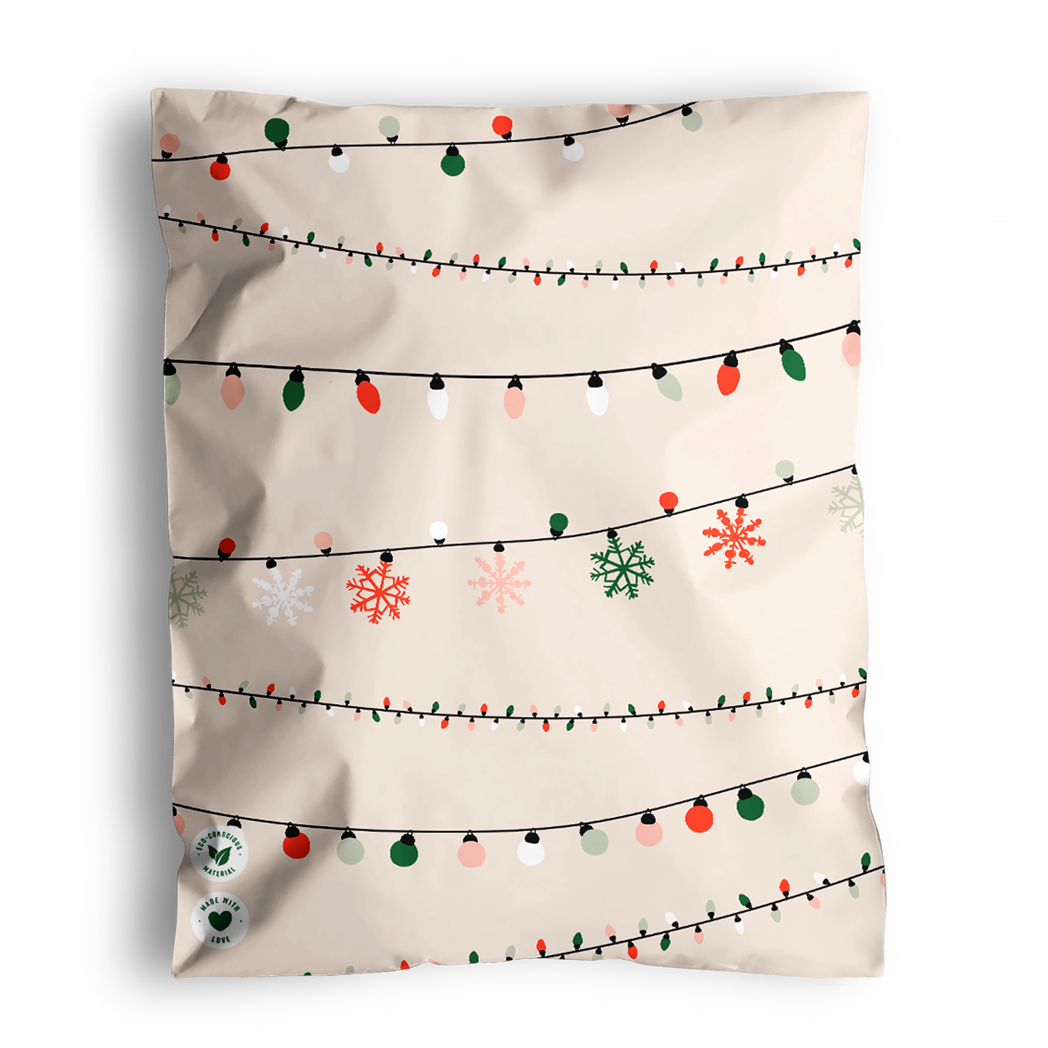 Holiday-themed bedding with impack.co Christmas Light Strings Biodegradable Mailers 10" x 13 Print and snowflake pattern.