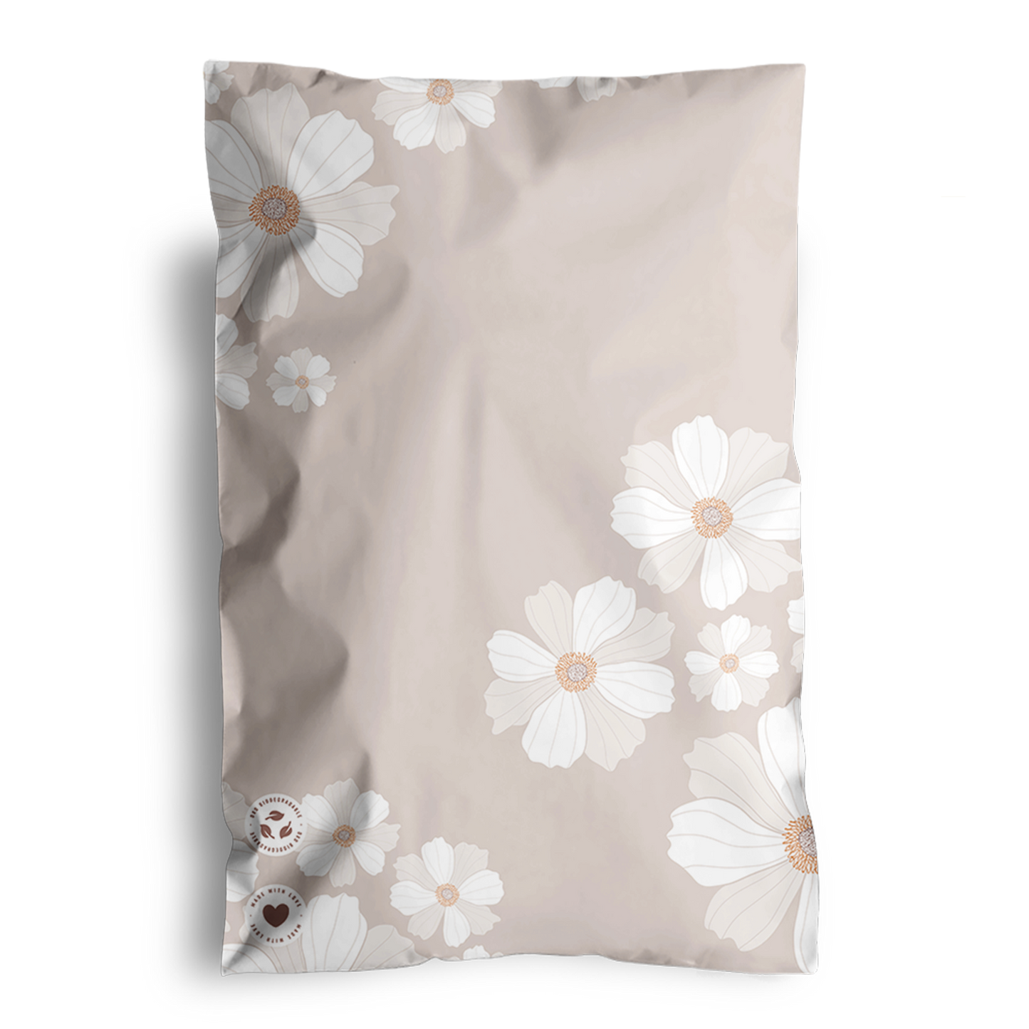 Floral patterned blanket or throw with a white and beige color scheme, packaged in impack.co Cosmos Biodegradable Mailers 6" x 9".