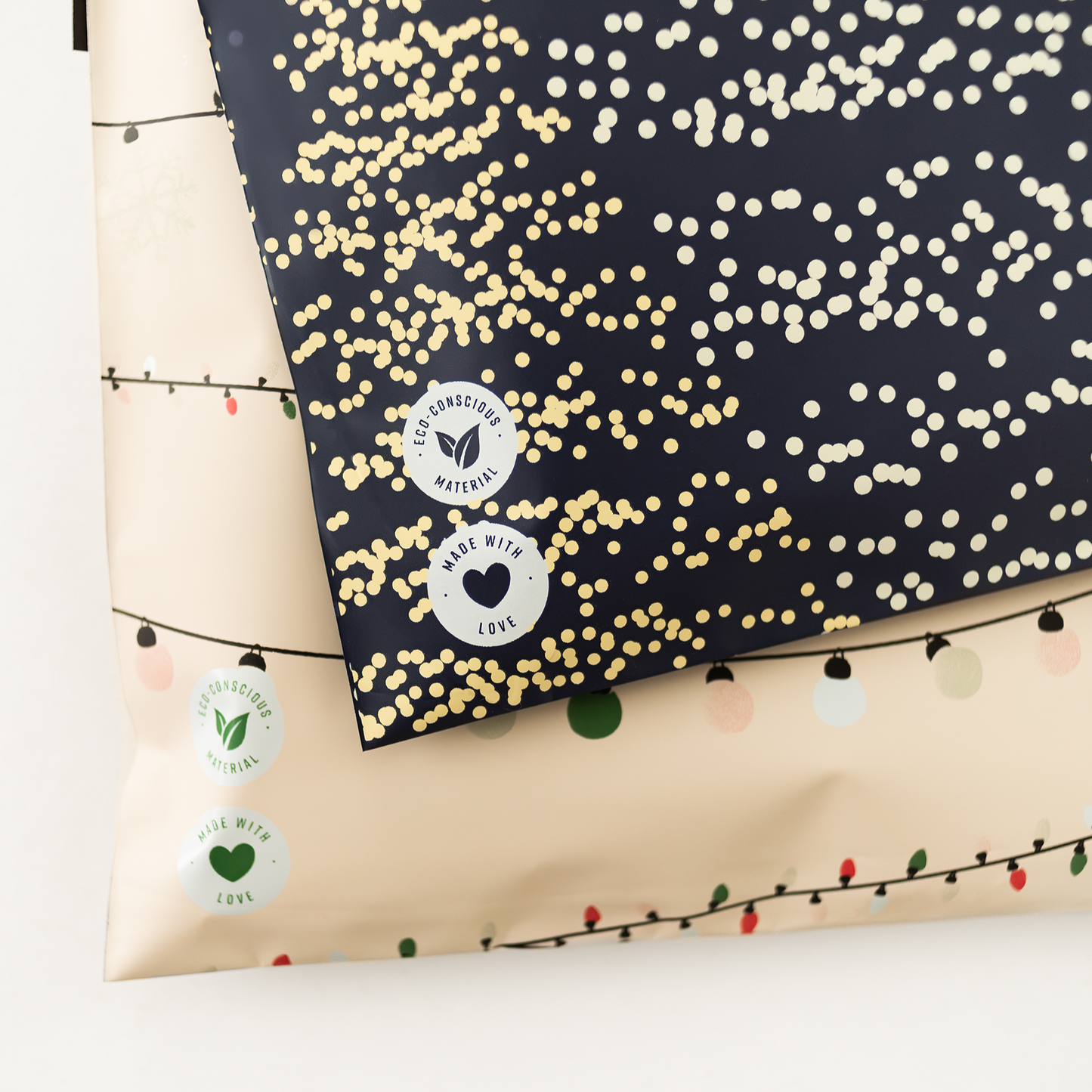 An eco-friendly gift bag adorned with Impack Christmas Light Strings Biodegradable Mailers 14.5" x 19" from impack.co.