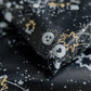 A recyclable and biodegradable Midnight Galaxy Mailers 10" x 13" wrapping paper with stars on it, sold by impack.co.