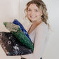 A woman holding a Midnight Galaxy Mailers 14.5" x 19" bag with a star pattern on it from impack.co.