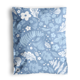 A patterned fabric with floral and leaf designs, perfect for creating Sapphire Evergreen Biodegradable Mailer Bags 10" x 13" by impack.co.