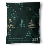 The impack.co Pine Forest Mailers (12" x 15.5") feature dark green, biodegradable material with Christmas tree designs and "Leaving Zero Waste Behind" text—ideal for eco-friendly holiday packaging.
