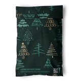 The Pine Forest Mailers 6" x 9" by impack.co feature dark green biodegradable material, gold and teal Christmas tree designs, "Leaving Zero Waste Behind" text, and a QR code—ideal for eco-friendly festive shipping.