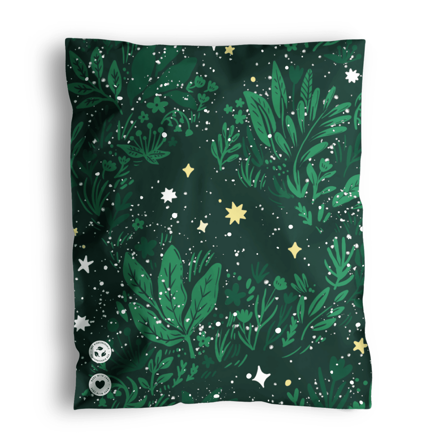 A patterned bandana with green foliage and star motifs on a dark background, packaged in impack.co Midnight Lush Mailers 10" x 13".
