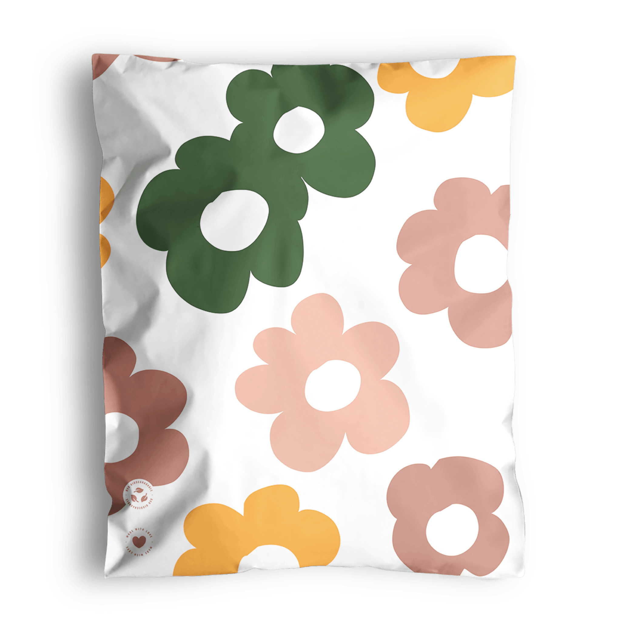 Graphic floral print pillow on a solid background, shipped in impack.co Daisy Multicolor Biodegradable Mailers 10" x 13".
