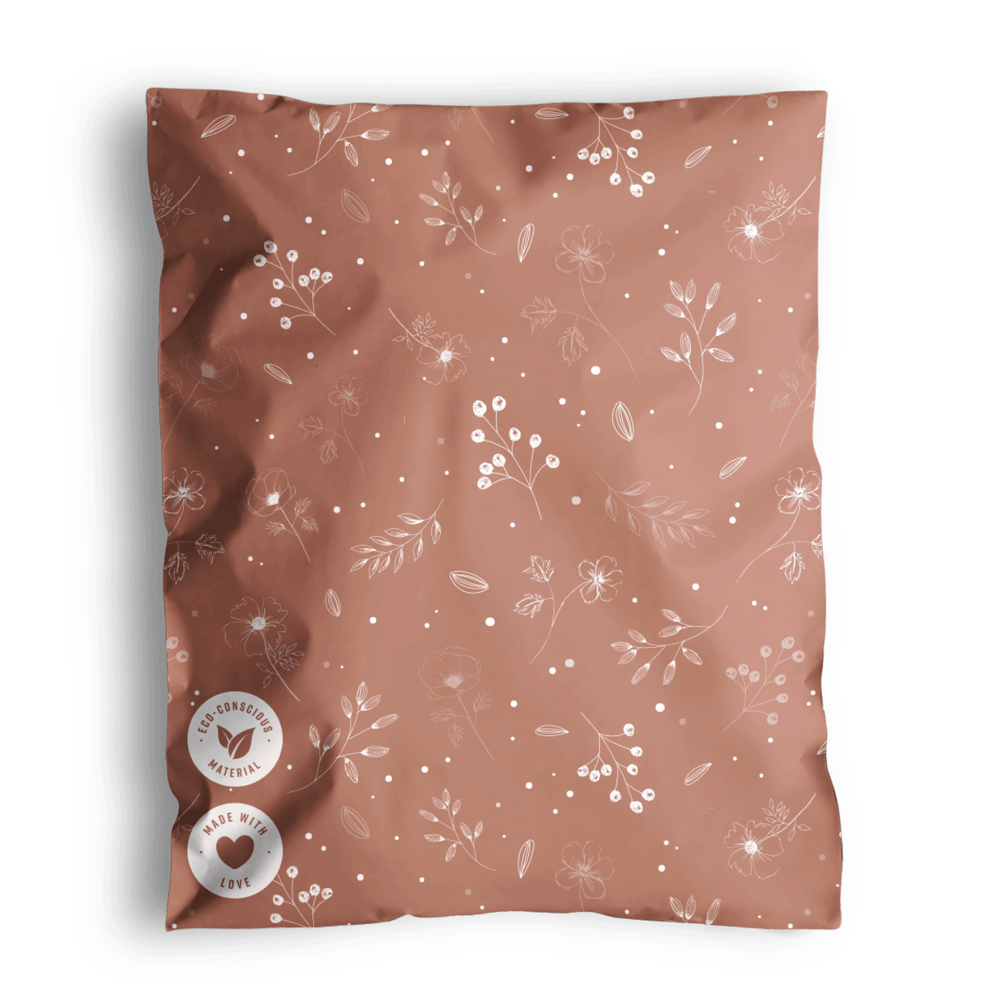 A patterned Floral 2D rosy brown fabric with a fabric tag, likely a swatch or textile sample, presented in impack.co biodegradable mailer bags.