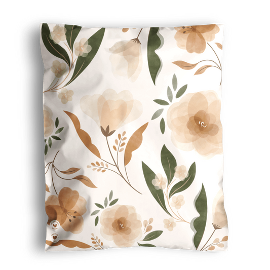A floral patterned scarf with beige, green, and brown tones, displayed on a transparent background and packaged in Camelia Bloom Biodegradable Mailers 14.5" x 19" from impack.co.