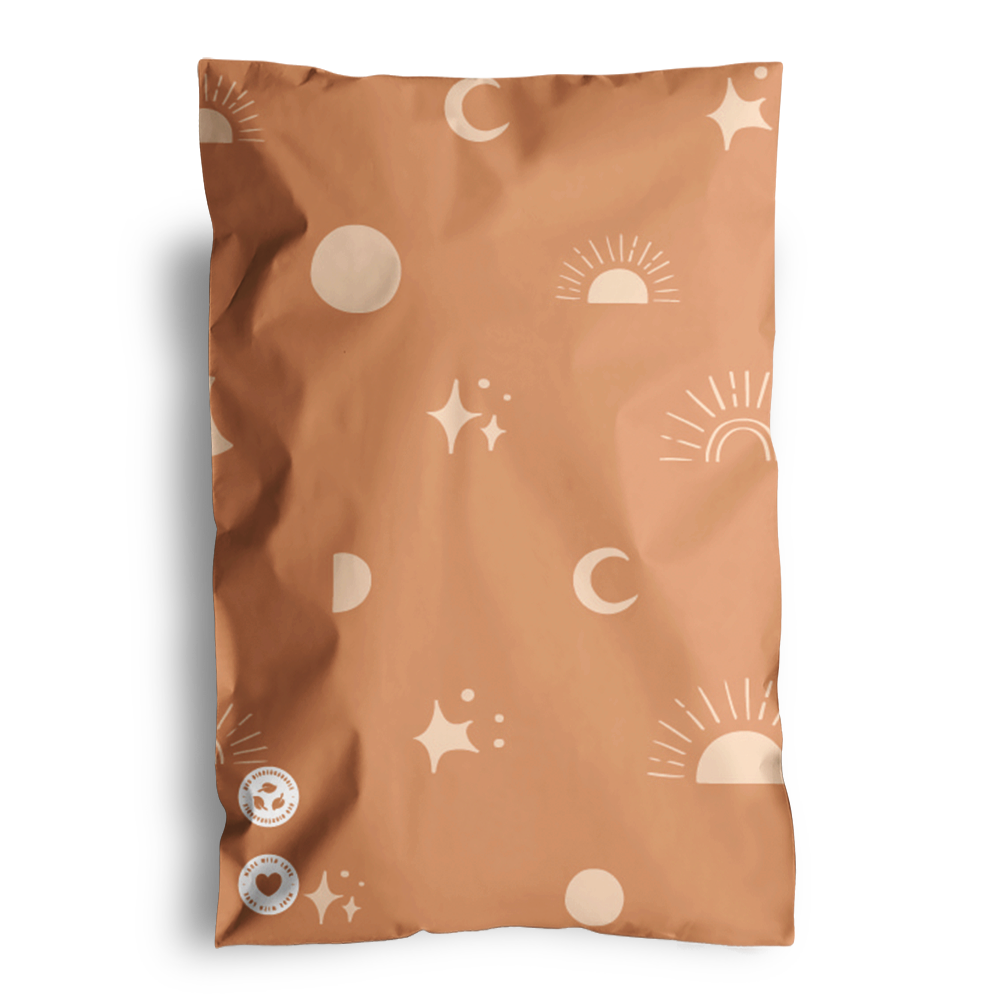 An unopened, sealed snack package with a Celestial Tan Mailers 6" x 9" design, enclosed in impack.co biodegradable mailer bags.