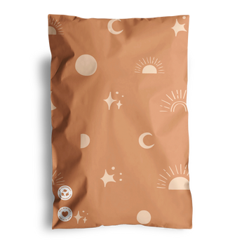 The impack.co SALE - Celestial Tan Mailers 6" x 9" CA features a stylish brown design with celestial tan prints of suns, moons, and stars, along with two circular symbols on the bottom left corner, making them perfect for transit protection.