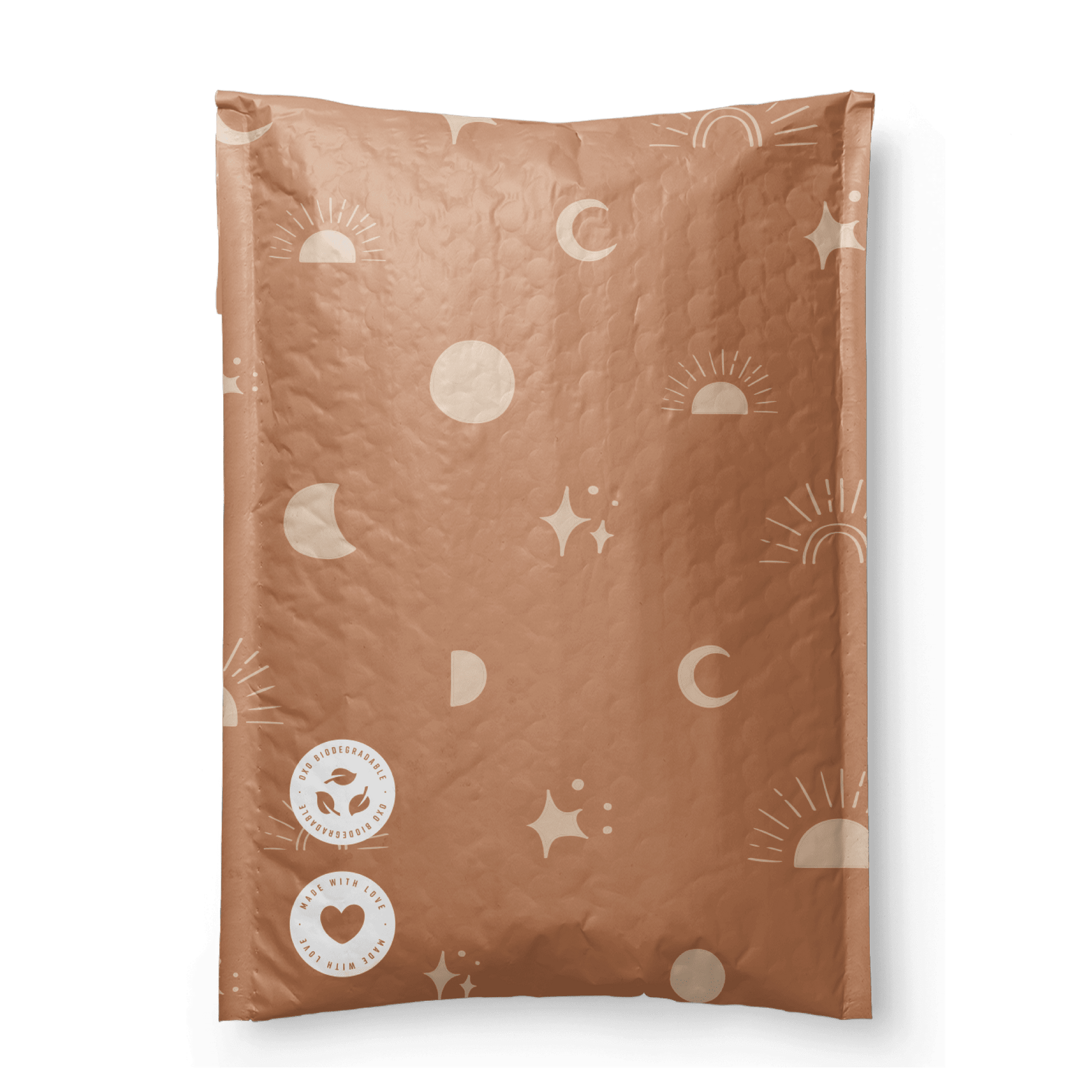 A patterned brown blanket or throw with Celestial Tan Biodegradable Bubble Mailers 8.5" x 12" designs folded on a dark, recycle-friendly surface by impack.co.