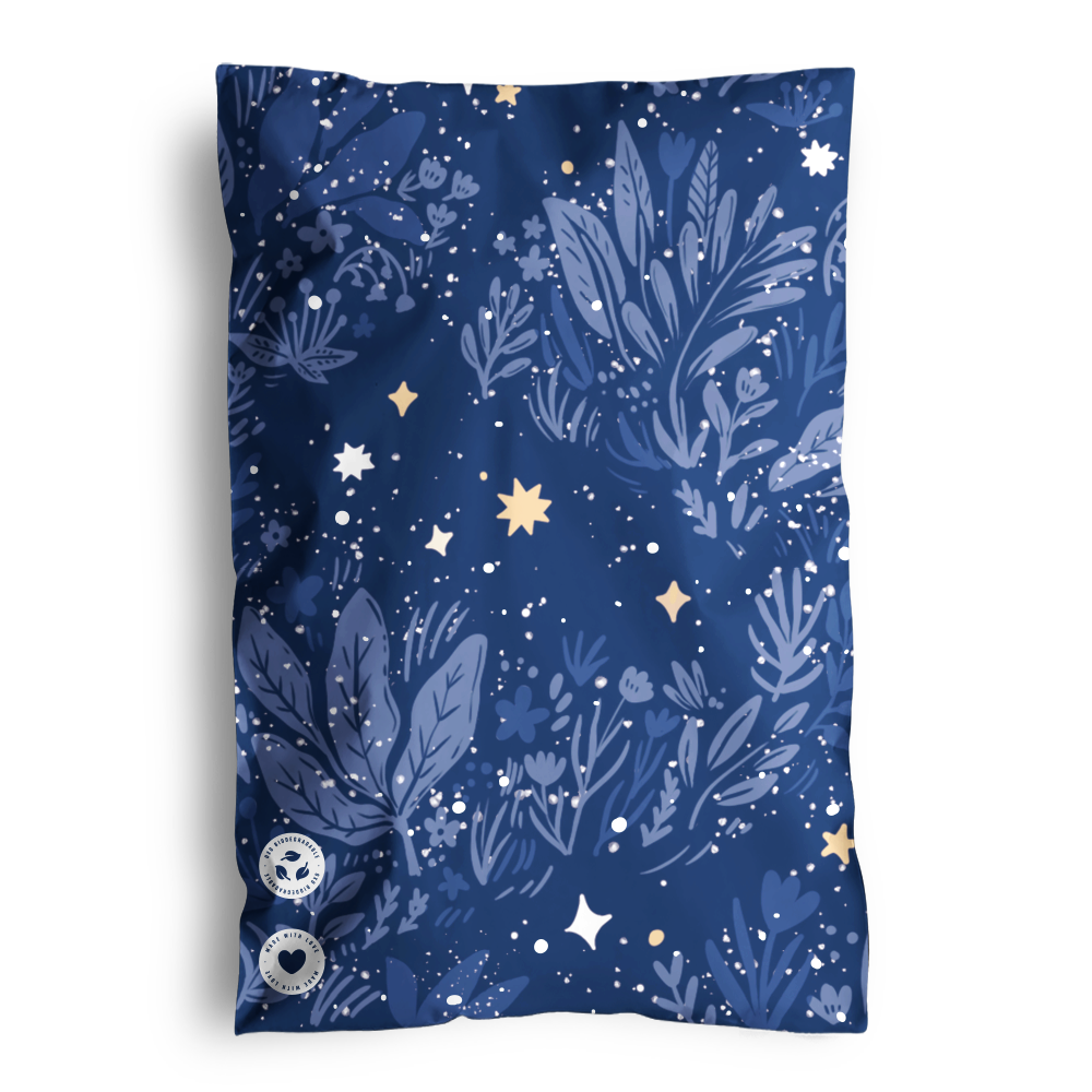 A navy blue scarf with a botanical and starry pattern, shipped in impack.co Midnight Indigo Mailers 6" x 9".