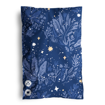 The decoratively adorned "SALE - Midnight Indigo Mailers 6\" x 9\"" by impack.co features sustainable dark blue fabric with leaf, star, and flower motifs in lighter hues. Two circular labels at the bottom left enhance its charm.