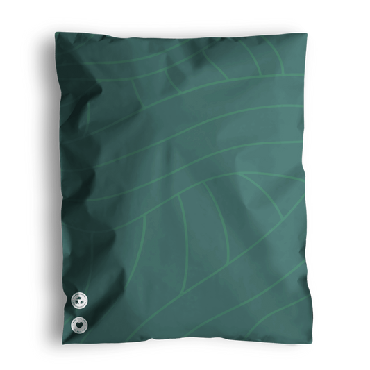 Illustration of a soft cushion with a green leaf pattern, crafted from 100% recyclable materials, and three visible buttons made of impack.co's Olive Leaf Biodegradable Mailers 10" x 13".
