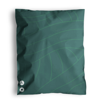 An olive green biodegradable mailer with a subtle leaf pattern and three silver grommets on the left edge from impack.co lies against a black background, showcasing versatile packaging.