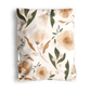 A biodegradable mailer bag 14.5" x 19" by impack.co with a beige and brown floral pattern.
