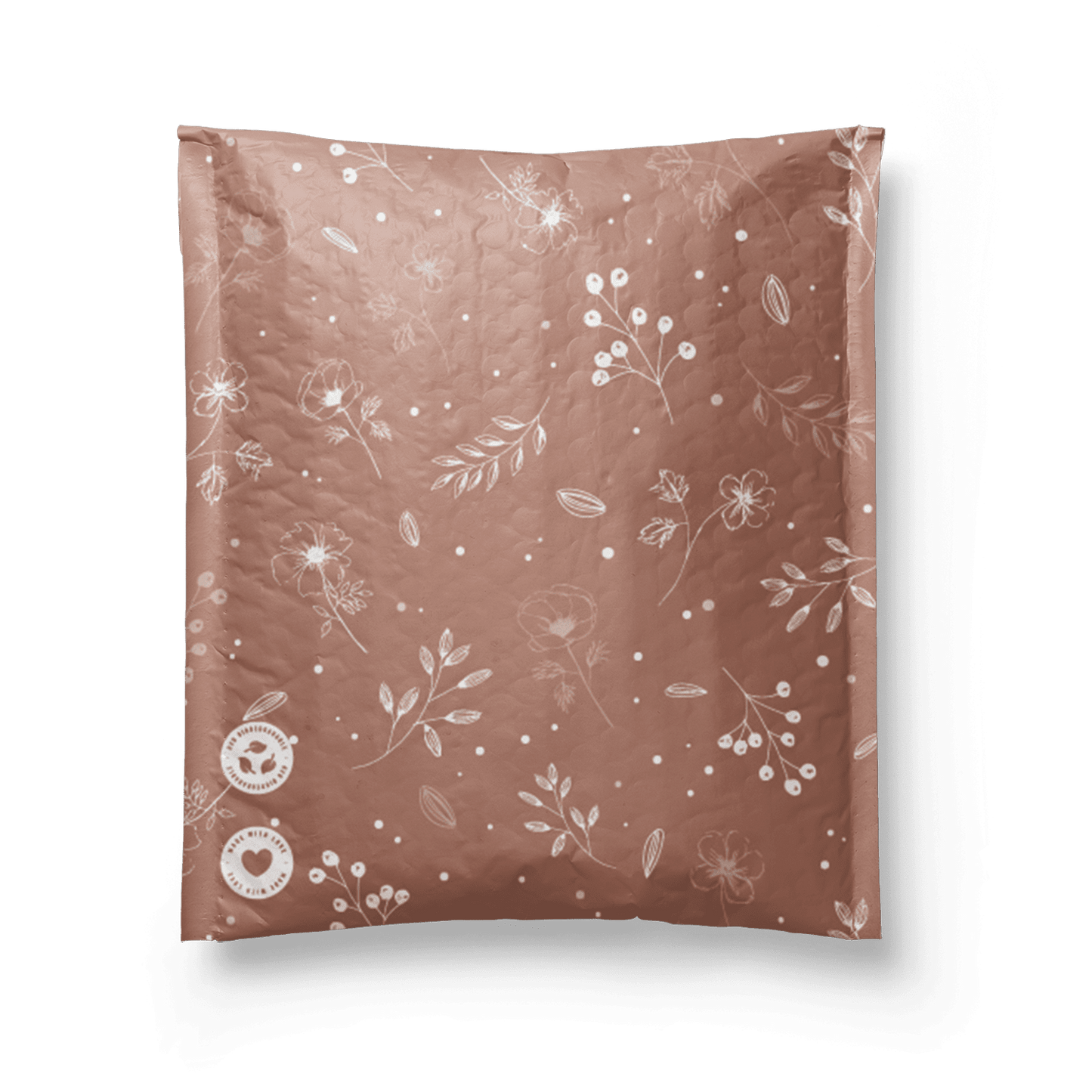 A Rosy Brown Biodegradable Bubble Mailer 6" x 9" with a floral pattern on it from impack.co.